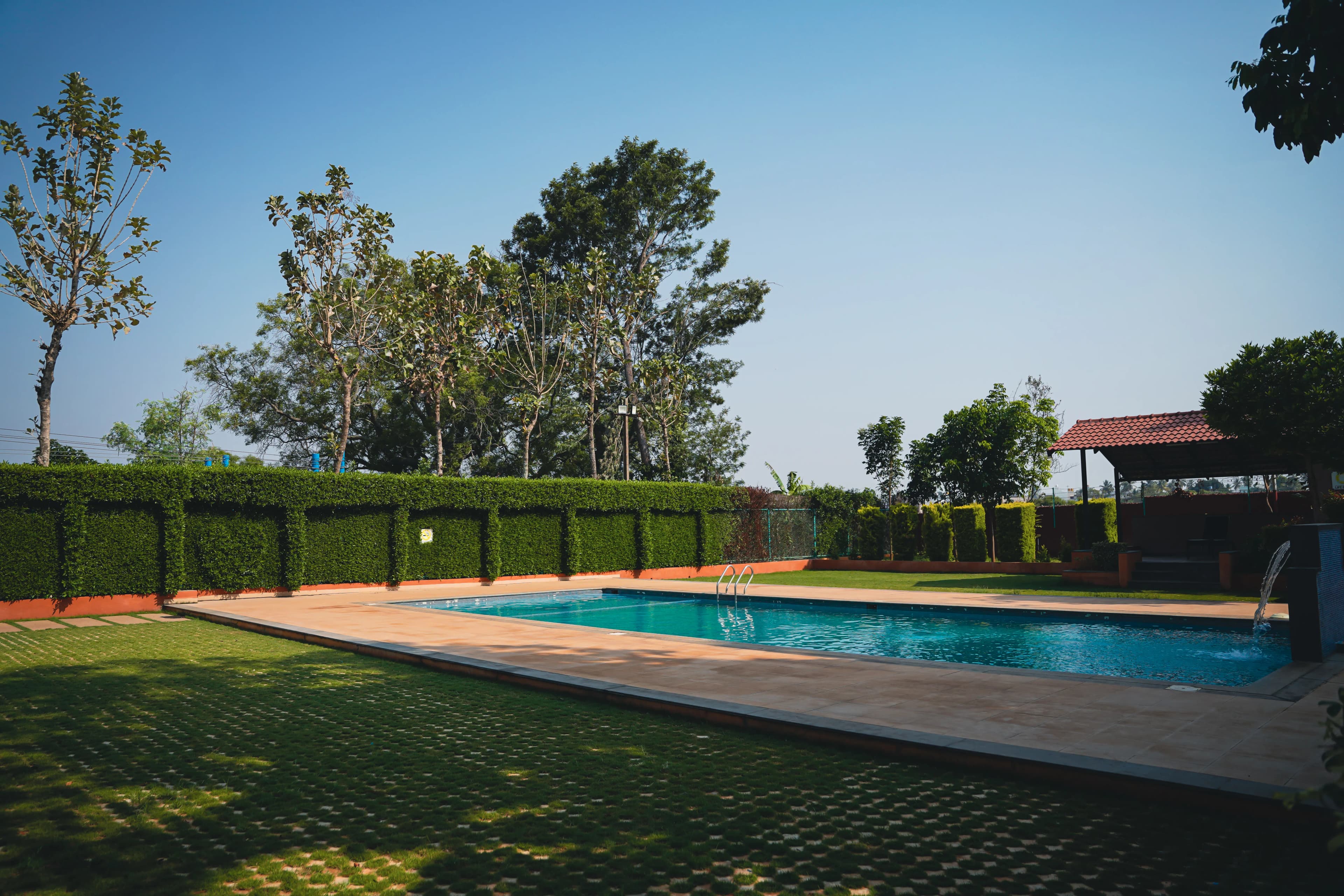 Sharmada Hidden Nest Resort pool and grounds