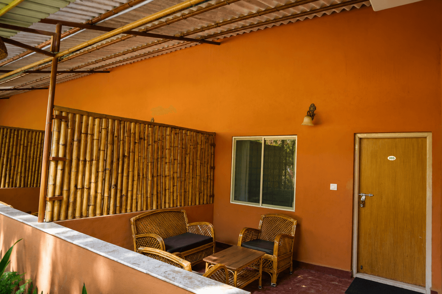 Private room verandah with cozy rattan seating